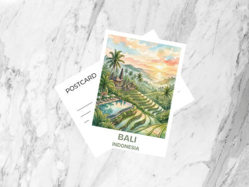 Postcard with a scenic illustration of Bali, Indonesia on a marble surface.